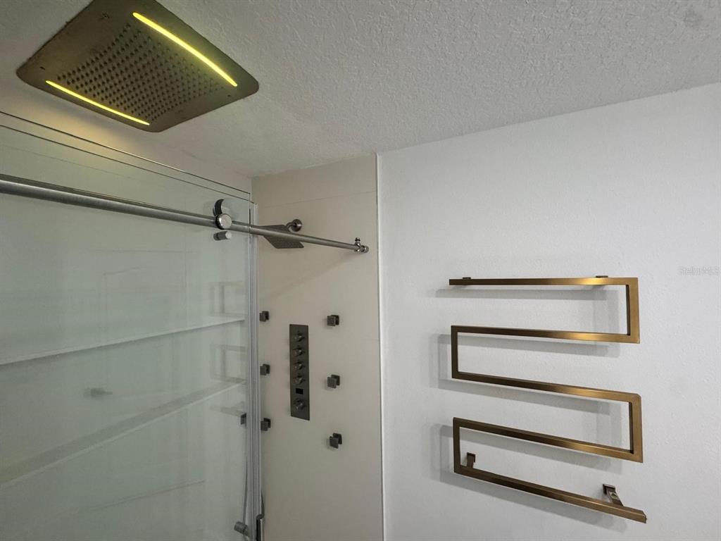 336 Redbud Road Palm Coast, FL 32137 - Photo 9 of 40 a bathroom with a shower