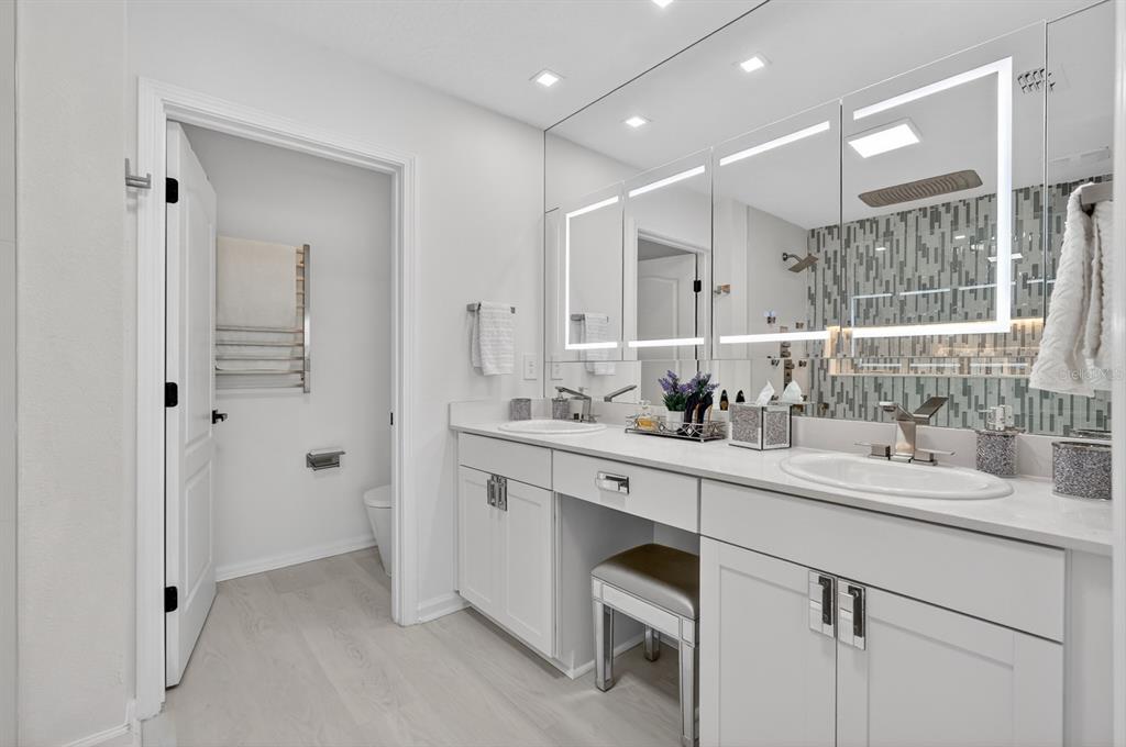 336 Redbud Road Palm Coast, FL 32137 - Photo 10 of 40 a bathroom with a sink double vanity and a mirror