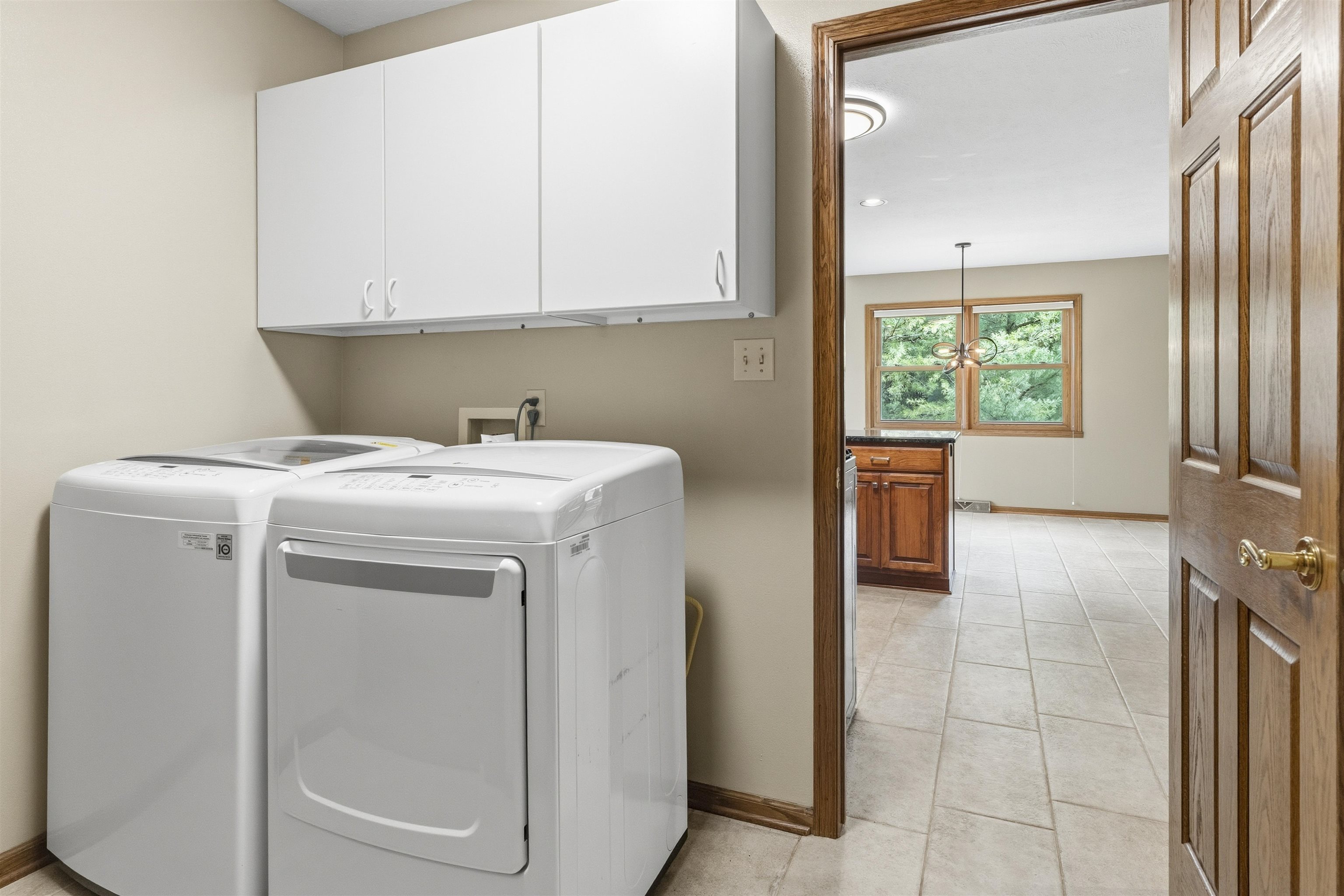 6990 Skyview Trail Roscoe, IL 61073 - Photo 17 of 43 a utility room with dryer and washer