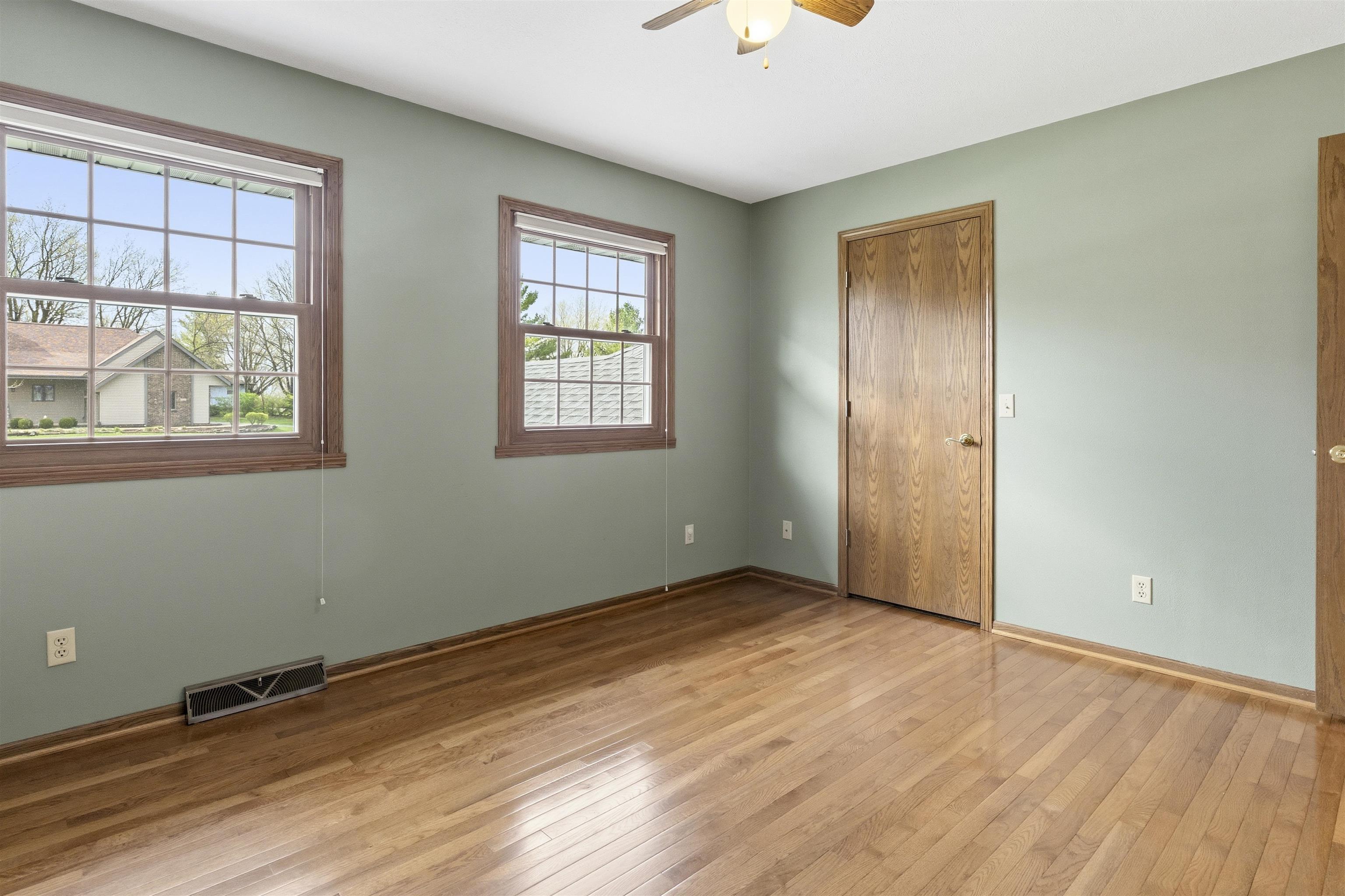 6990 Skyview Trail Roscoe, IL 61073 - Photo 27 of 43 an empty room with windows and closet