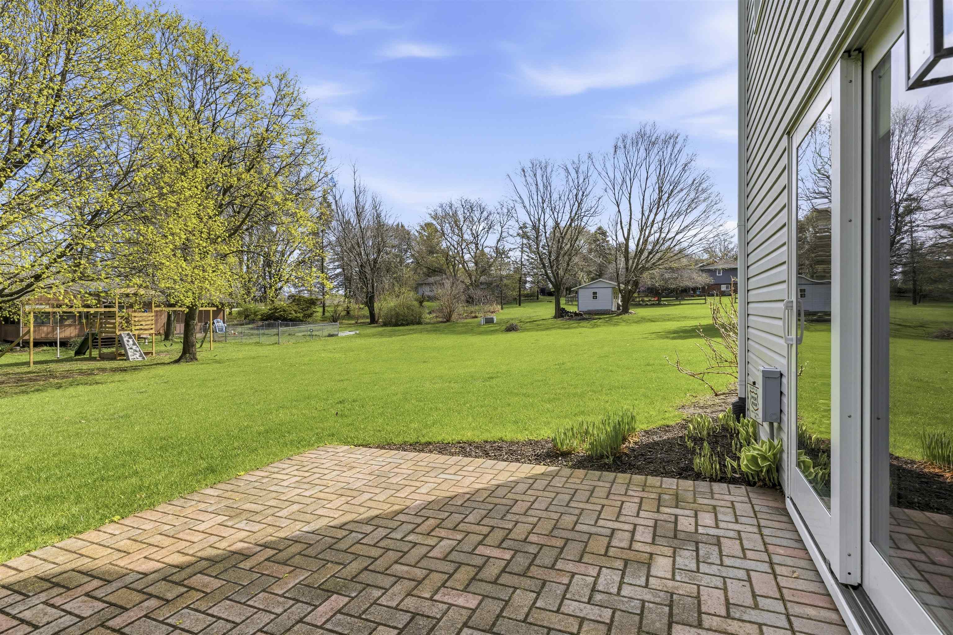 6990 Skyview Trail Roscoe, IL 61073 - Photo 34 of 43 a view of a garden with pathway