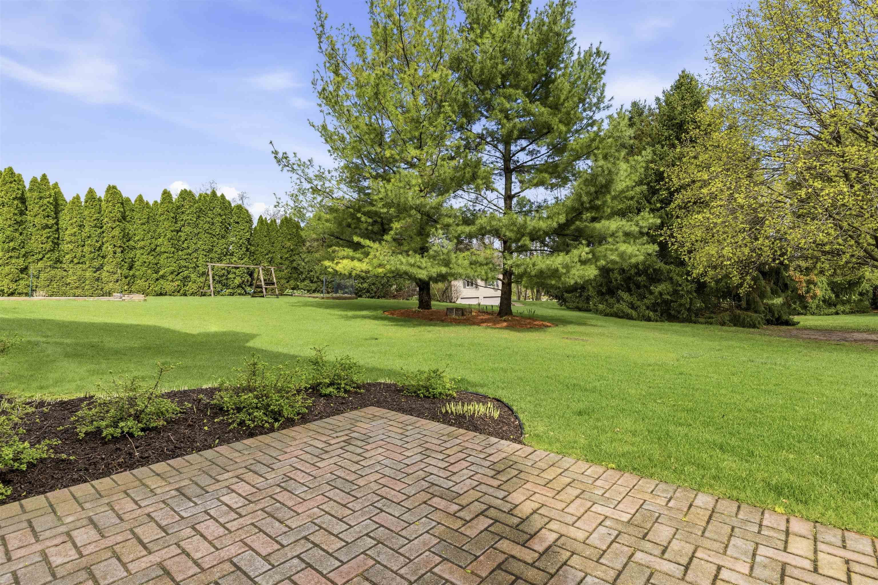 6990 Skyview Trail Roscoe, IL 61073 - Photo 36 of 43 a view of a park with plants and trees