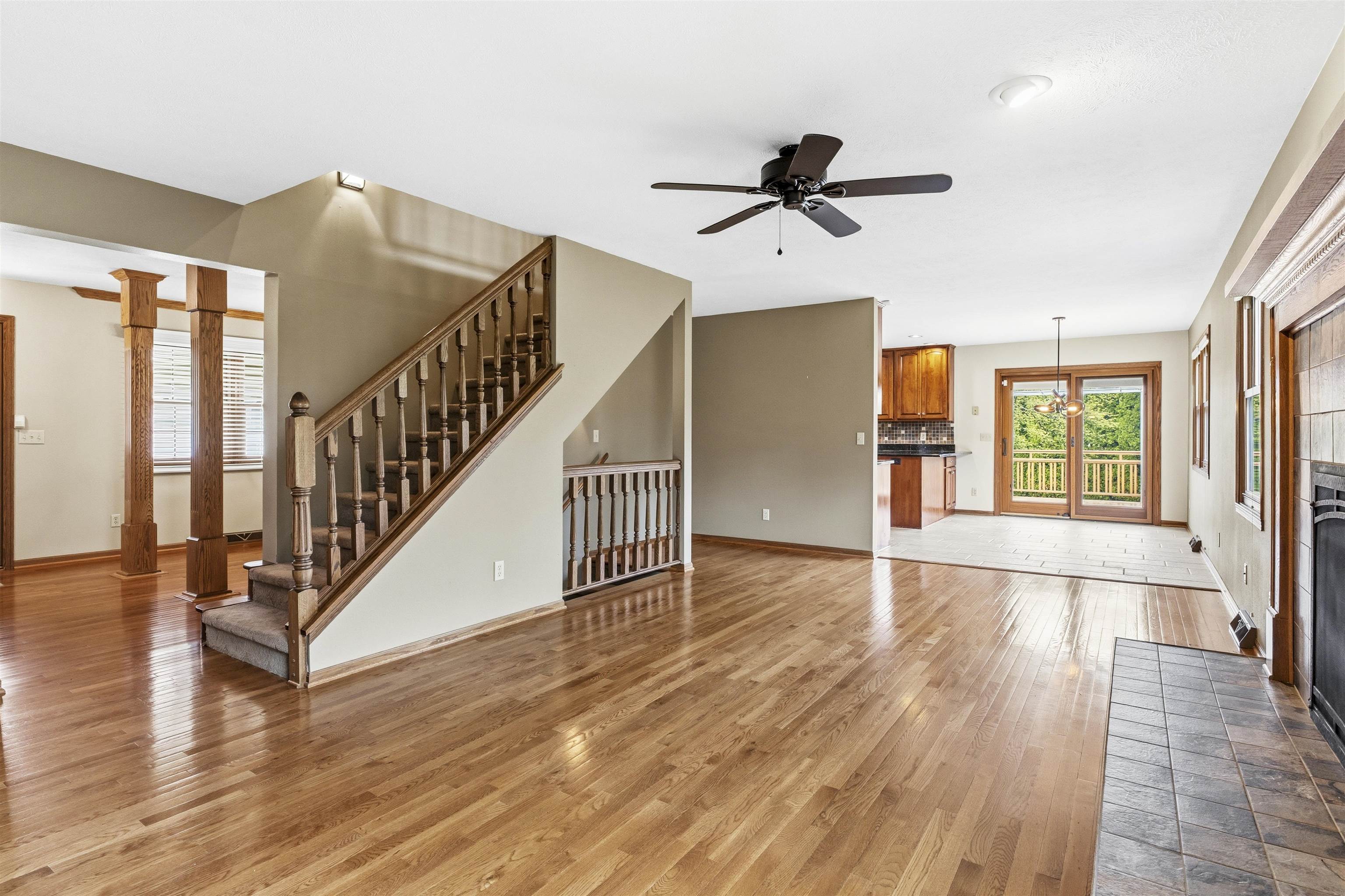 6990 Skyview Trail Roscoe, IL 61073 - Photo 10 of 43 a view of empty room with wooden floor and fan