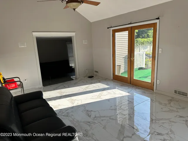 a living room with a large window