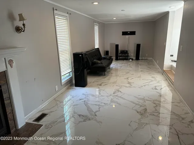 a view of a livingroom with a fireplace