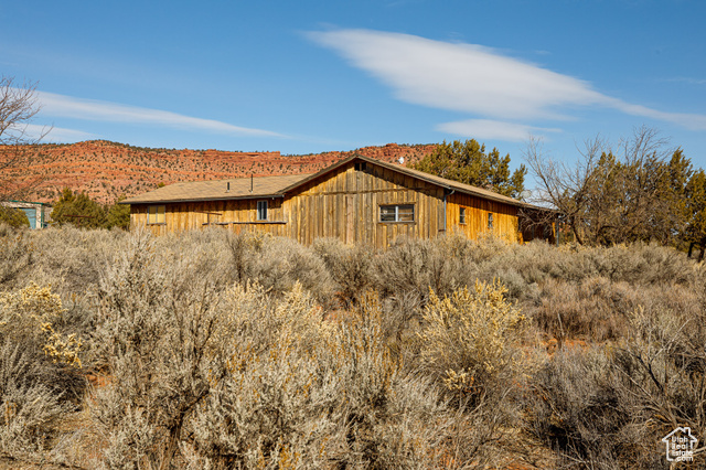 6026 East Zion Road Kanab, UT 84741 - Photo 8 of 27 View of property exterior featuring a mountain view