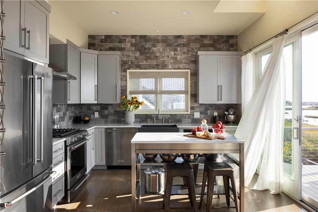 56 Conch Road Narragansett, RI 02882 - Photo 9 of 21 Kitchen w/Water View, Slider to Upper Deck