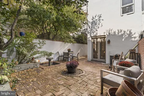 a view of staircase with wooden floor