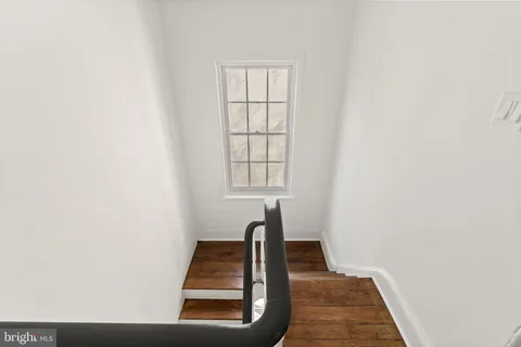 a kitchen with a sink cabinets and appliances