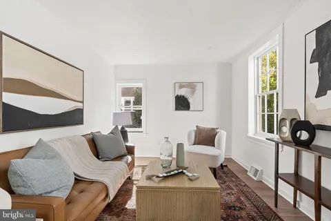 a bedroom with a bed and a fireplace