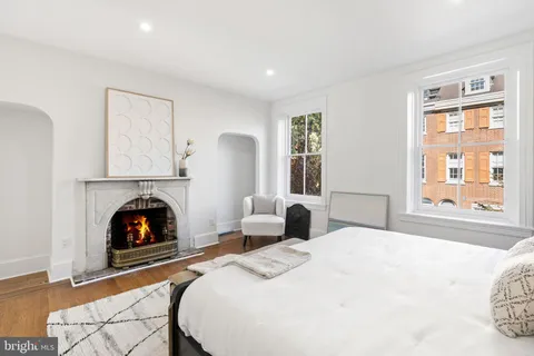 a view of a balcony with wooden floor and city view