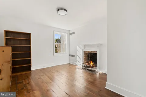 a view of a hallway with stairs