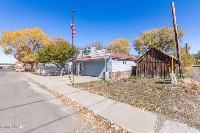 a view of a house next to a road