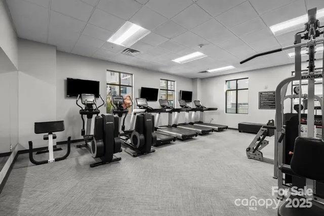 a view of a chairs and table in the patio