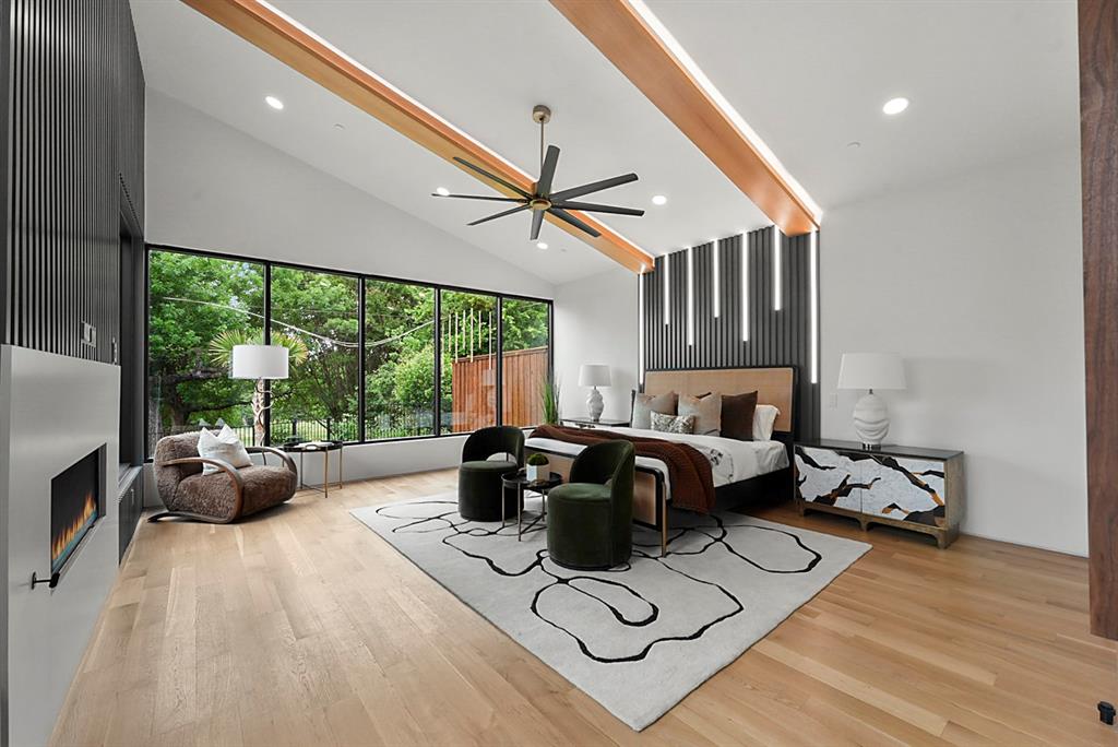 9457 Waterview Road Dallas, TX 75218 - Photo 19 of 25 Vaulted ceilings with exposed wood beams define this spacious room