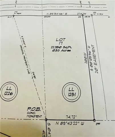 a view of a door with a white car parked