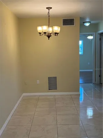 a kitchen with stainless steel appliances granite countertop wooden cabinets a sink and dishwasher