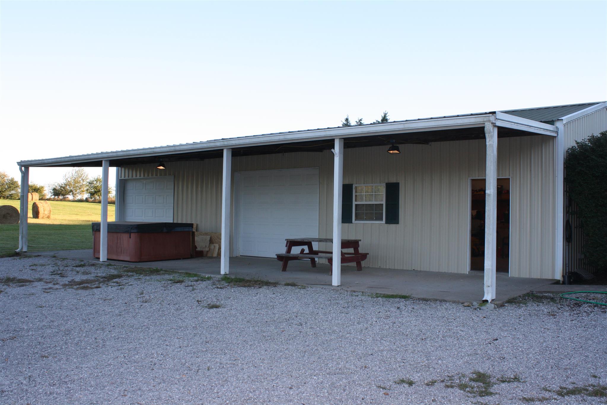 245 South Leath Road Portland, TN 37148 - Photo 13 of 19 a view of backyard with outdoor seating and garage