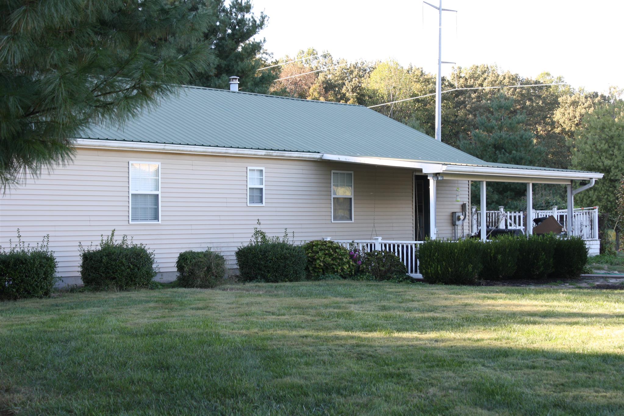 245 South Leath Road Portland, TN 37148 - Photo 18 of 19 a front view of a house with garden
