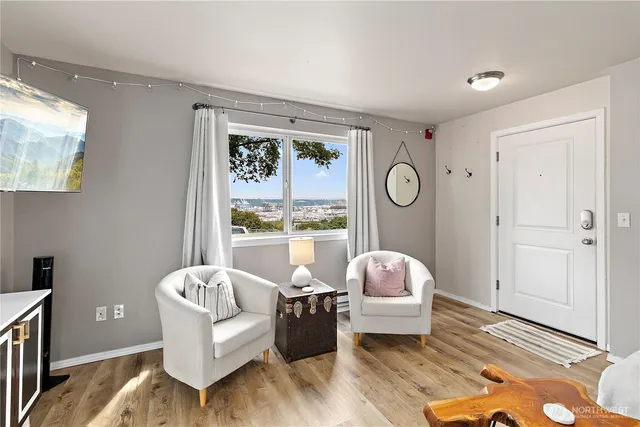 a living room with furniture and a window