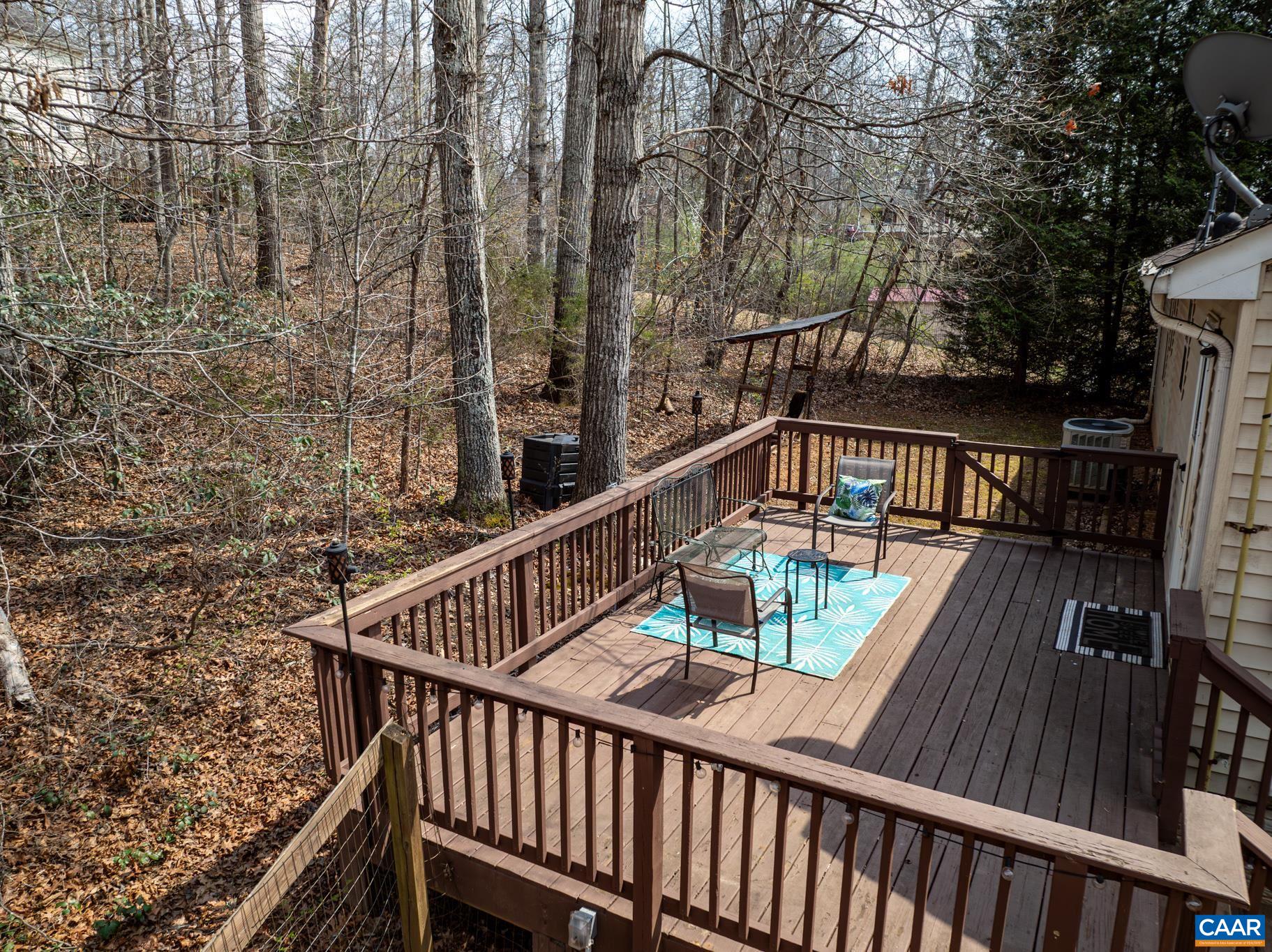 1029 West Daffodil Road Ruckersville, VA 22968 - Photo 39 of 39 a view of balcony with wooden floor and fence
