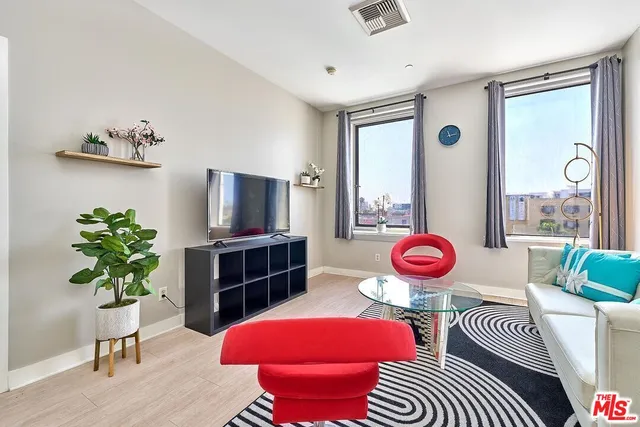 a view of a livingroom with furniture