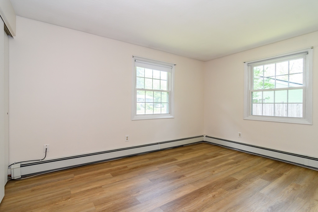 33 Eisenhower Road Framingham, MA 01701 - Photo 14 of 20 an empty room with a window