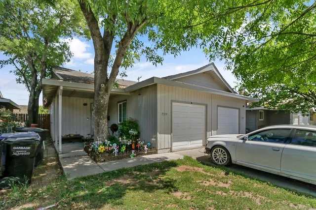 a house view with a garden space