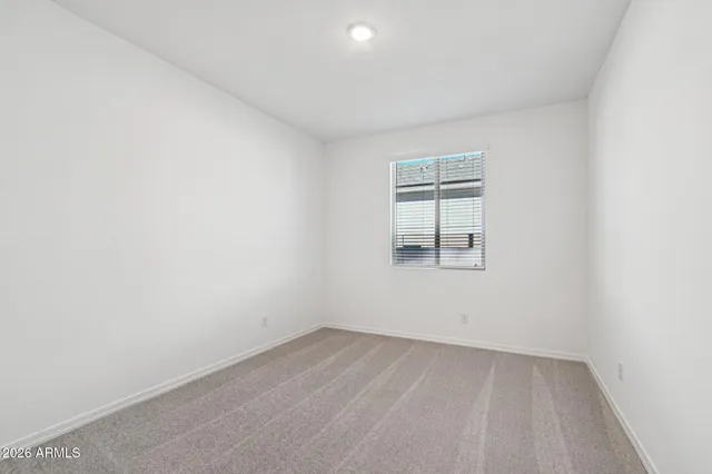 a view of a hallway with a chandelier