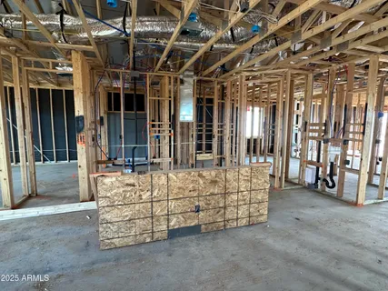 a view of an empty room with white walls