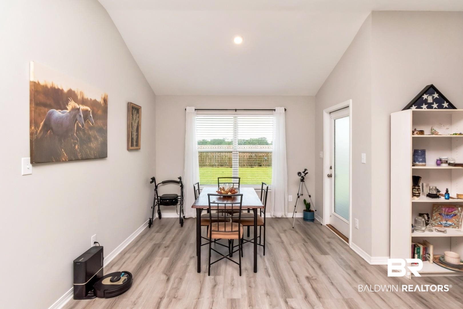 1295 Hayward Loop Foley, AL 36535 - Photo 12 of 29 Spacious interior featuring vaulted ceilings and wood-finish flooring