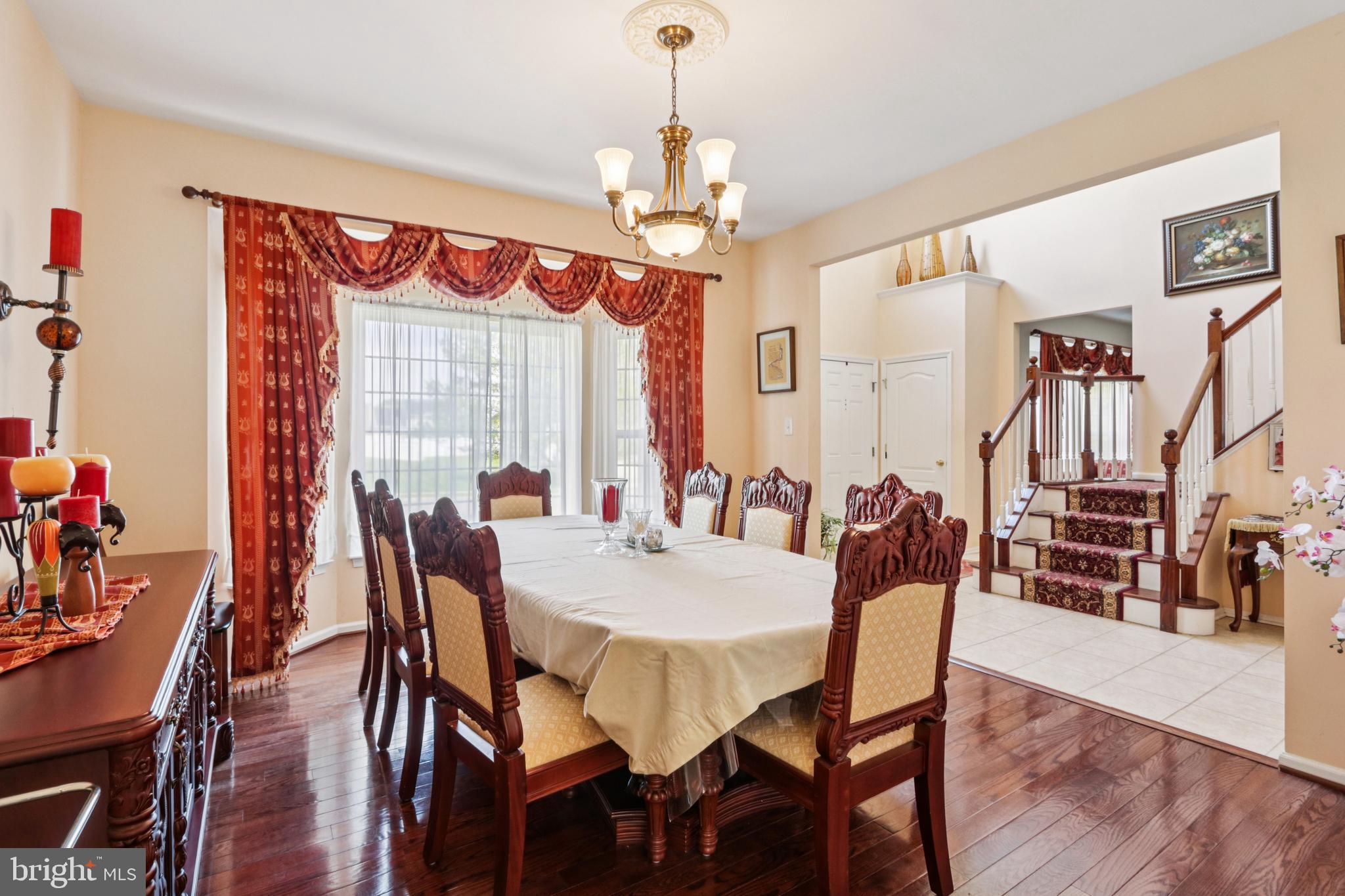 104 Ryans Run Sicklerville, NJ 08081 - Photo 12 of 94 a view of a dining room with furniture window and wooden floor