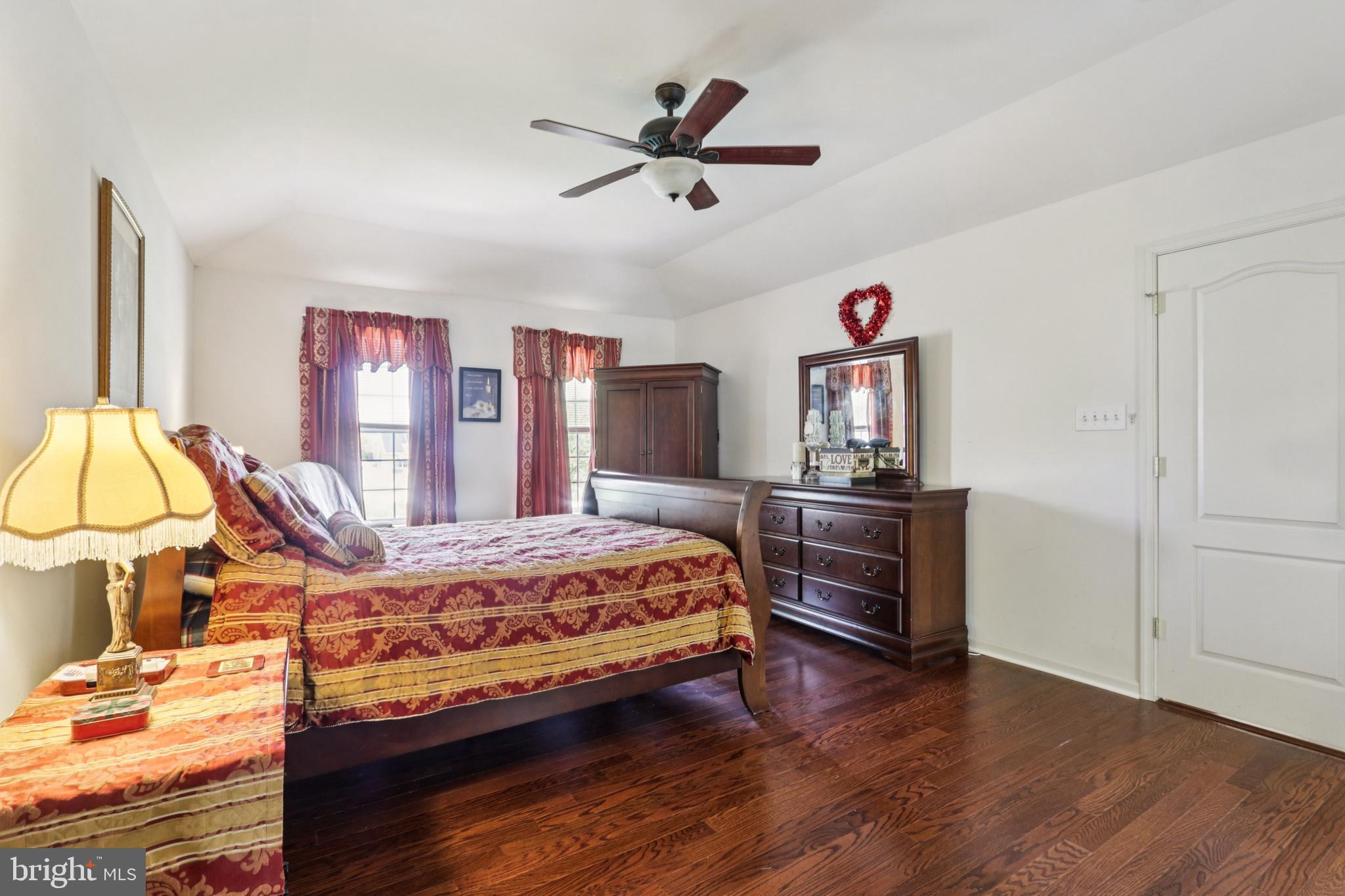 104 Ryans Run Sicklerville, NJ 08081 - Photo 51 of 94 a bedroom with a bed and wooden floor