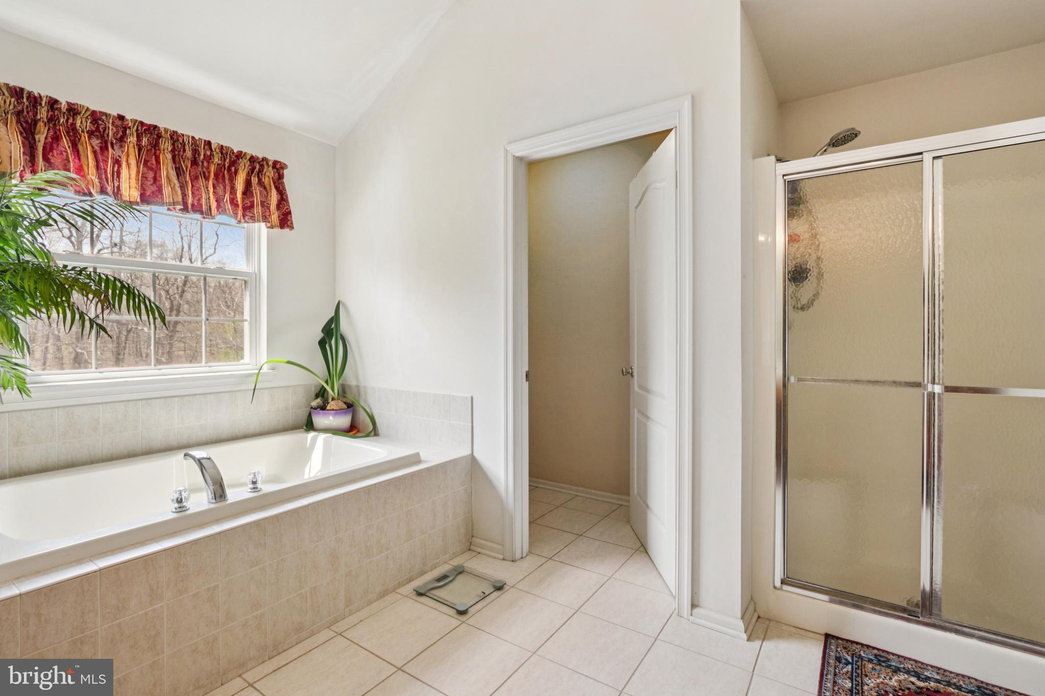 104 Ryans Run Sicklerville, NJ 08081 - Photo 56 of 94 a bathroom with a tub and a shower