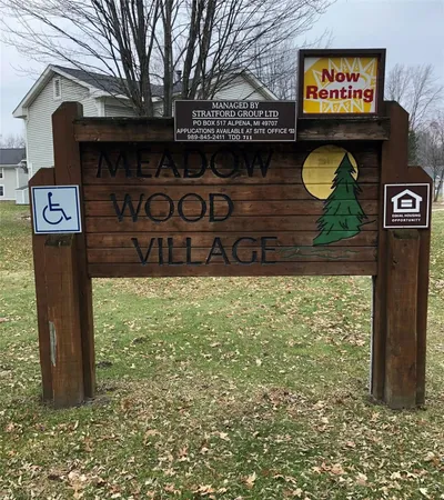 a sign broad in front of a building
