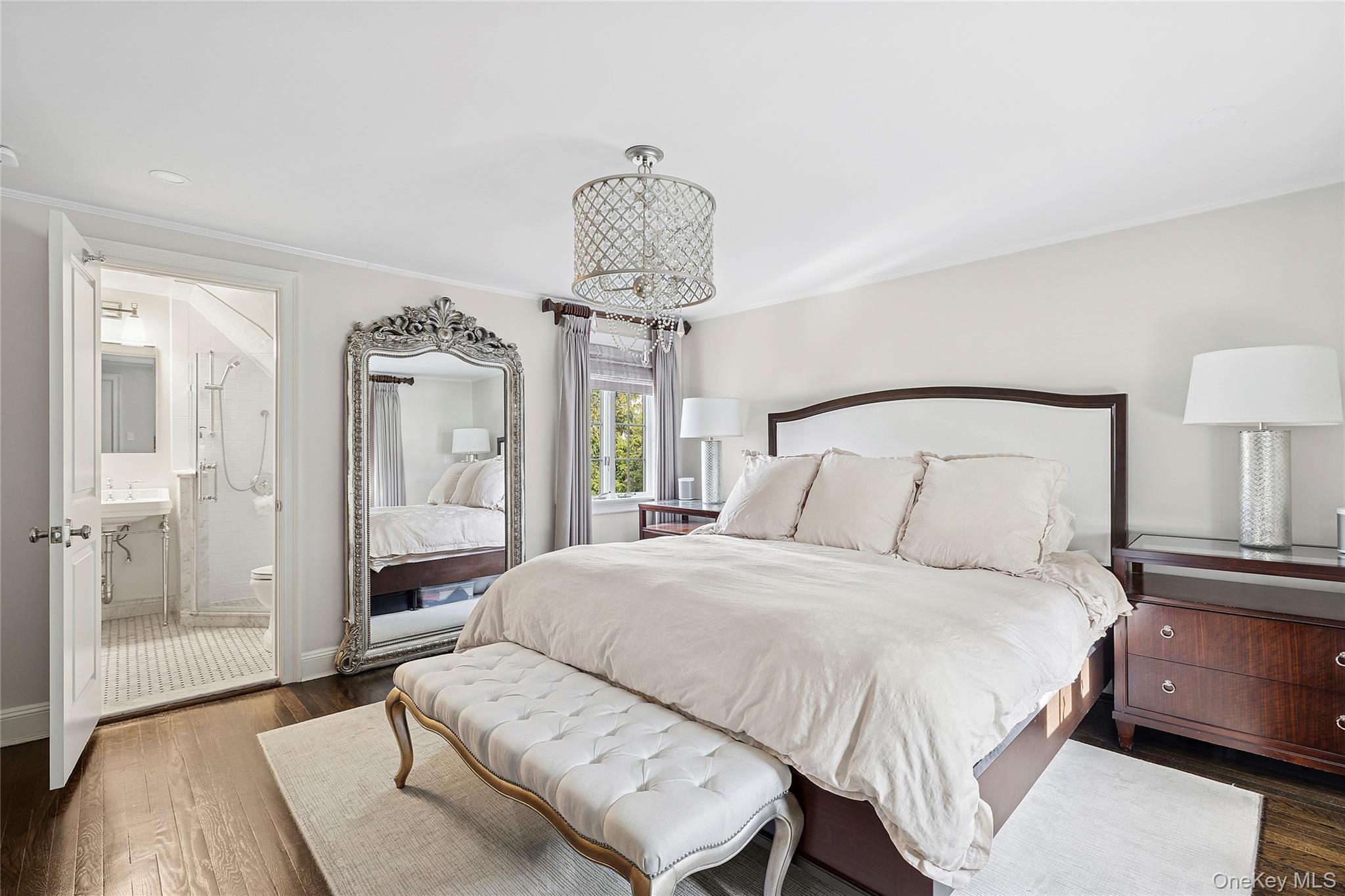 44 Old Ox Road Manhasset, NY 11030 - Photo 13 of 23 a bedroom with a bed mirror and window
