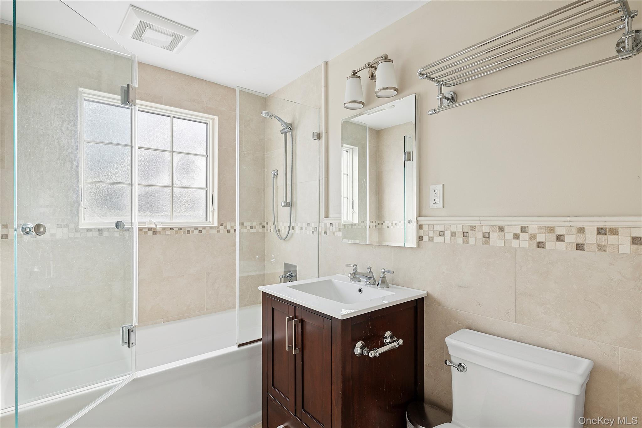 44 Old Ox Road Manhasset, NY 11030 - Photo 16 of 23 a bathroom with a sink a toilet and shower
