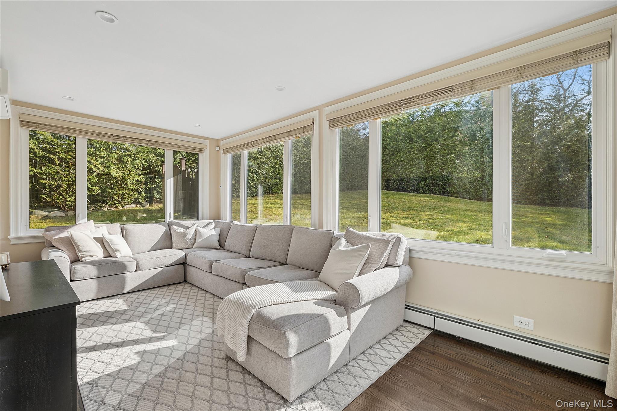 44 Old Ox Road Manhasset, NY 11030 - Photo 9 of 23 a living room with furniture and a large window