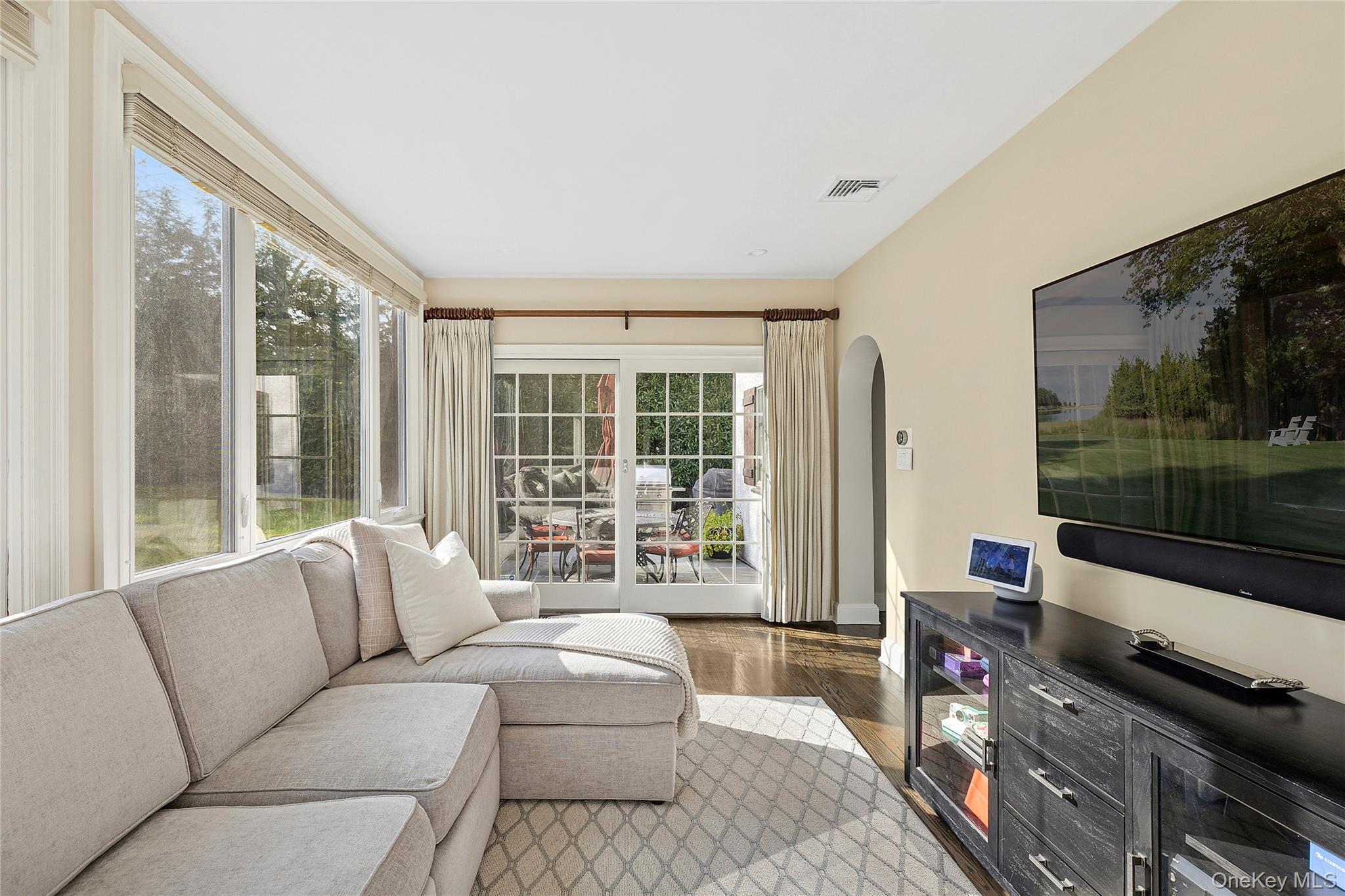 44 Old Ox Road Manhasset, NY 11030 - Photo 10 of 23 a living room with furniture and a flat screen tv