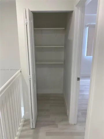 a view of a walk in closet