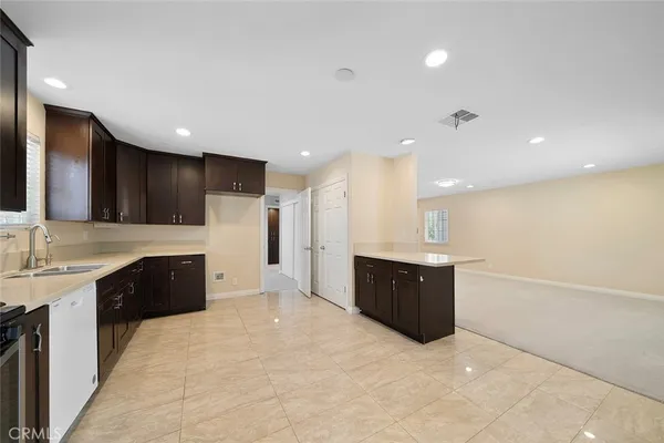 a large kitchen with a large counter top
