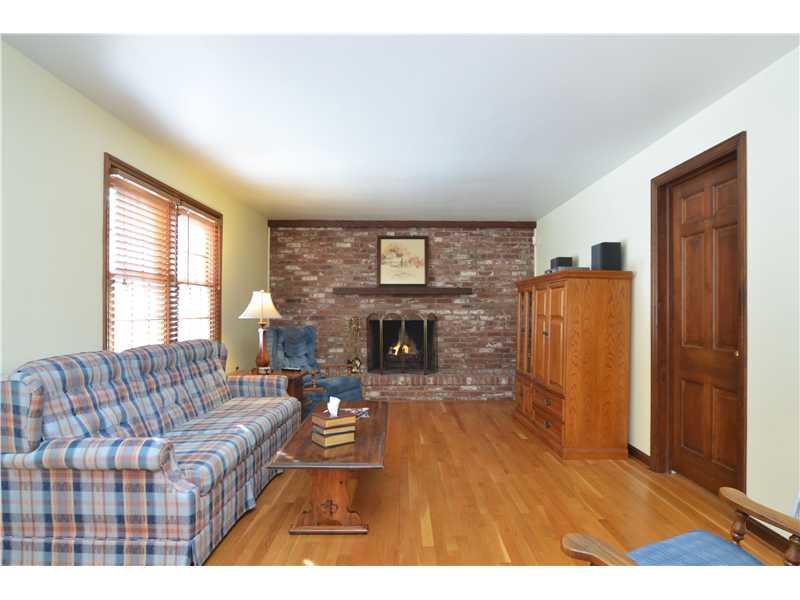604 Trotwood Ridge Road Upper St. Clair, PA 15241 - Photo 12 of 25 Family Room. Brick floor to ceiling fireplace for cold winter nights.