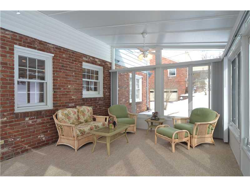 604 Trotwood Ridge Road Upper St. Clair, PA 15241 - Photo 22 of 25 Sunroom. Walls of windows bring the outdoors in.