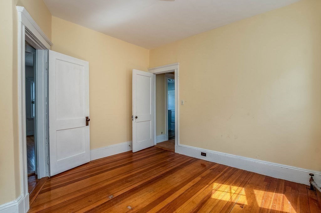 73 Westbourne Street Boston, MA 02131 - Photo 15 of 41 a view of a room with wooden floor