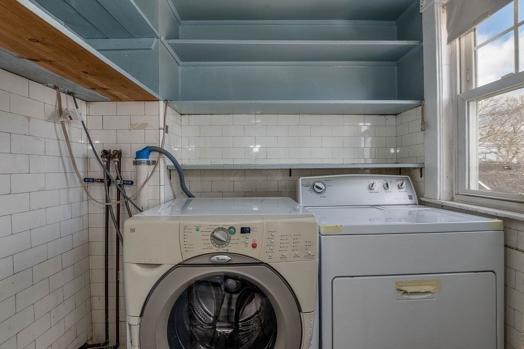 73 Westbourne Street Boston, MA 02131 - Photo 21 of 41 a utility room with dryer and washer