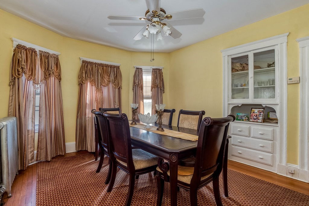73 Westbourne Street Boston, MA 02131 - Photo 30 of 41 a view of a dining room with furniture and window