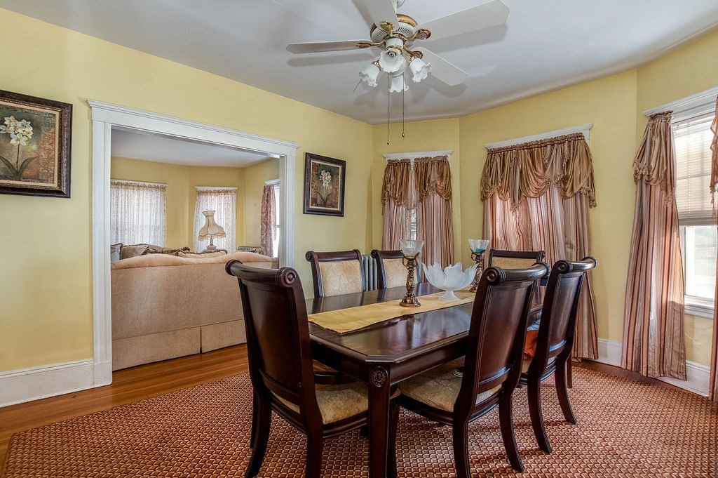 73 Westbourne Street Boston, MA 02131 - Photo 31 of 41 a view of a dining room with furniture and window