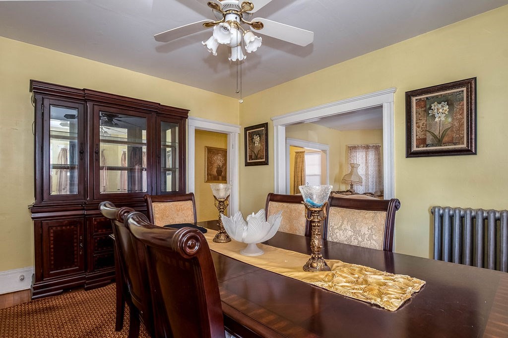 73 Westbourne Street Boston, MA 02131 - Photo 32 of 41 a view of a dining room with furniture
