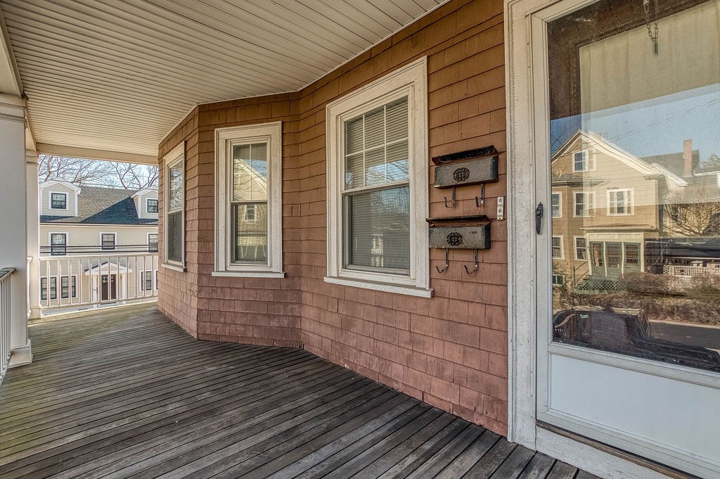 73 Westbourne Street Boston, MA 02131 - Photo 40 of 41 a view of a brick house with many windows