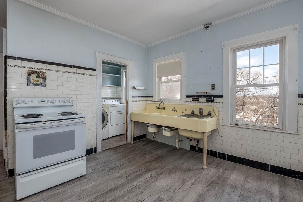73 Westbourne Street Boston, MA 02131 - Photo 8 of 41 a room with pool table and windows